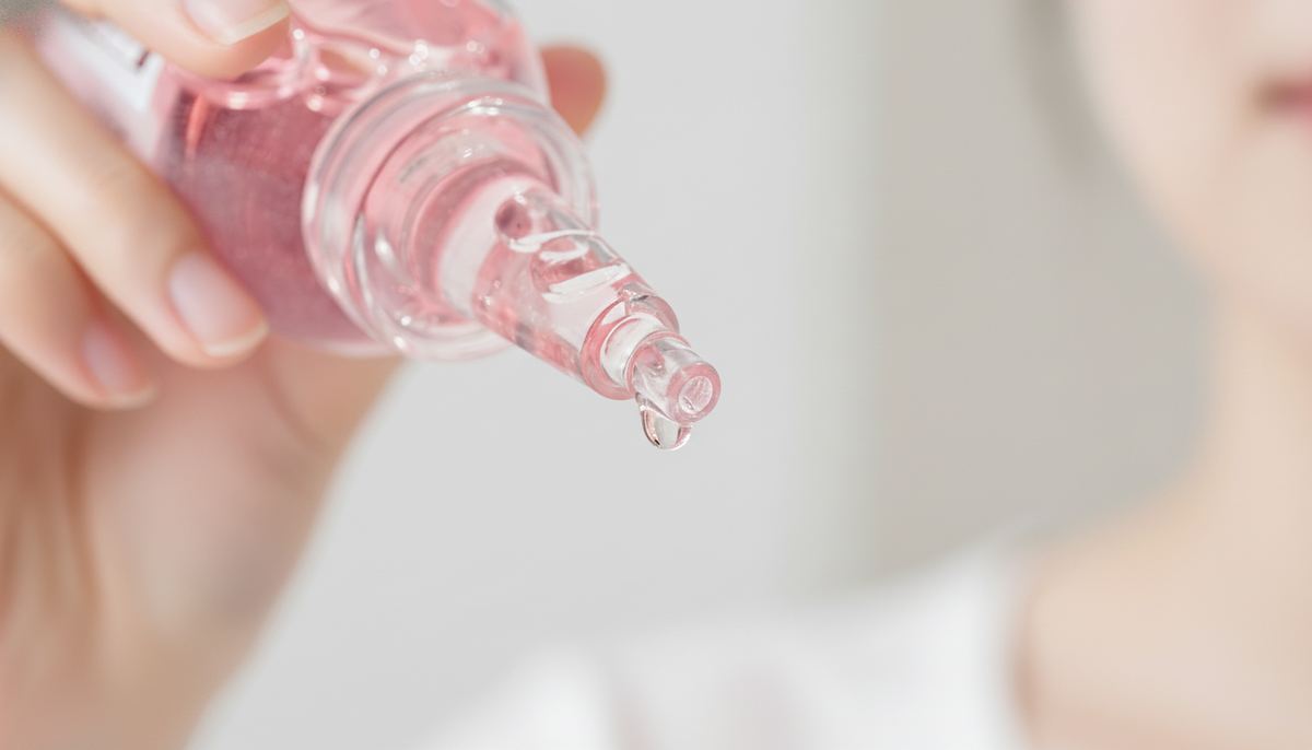 Cicacare Basic Peeling Ampoule dispensing a drop onto skin